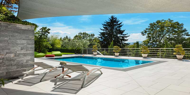 veranda piscine jardin